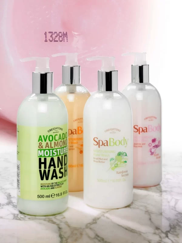 four cosmetic bottles with batch code